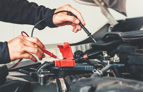 A car battery being tested at a shop for auto repair in Gaithersburg that also specialized in electrical repair in Gaithersburg