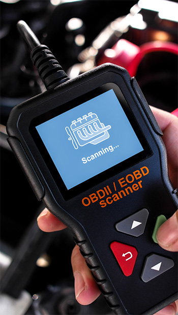 Car electronics being scanned by a device