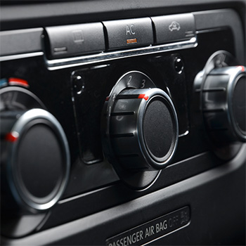 AC knobs inside a car in Gaithersburg